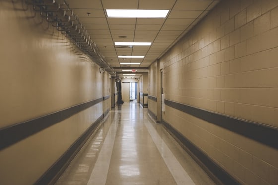 Quiet hospital corridor with a gurney